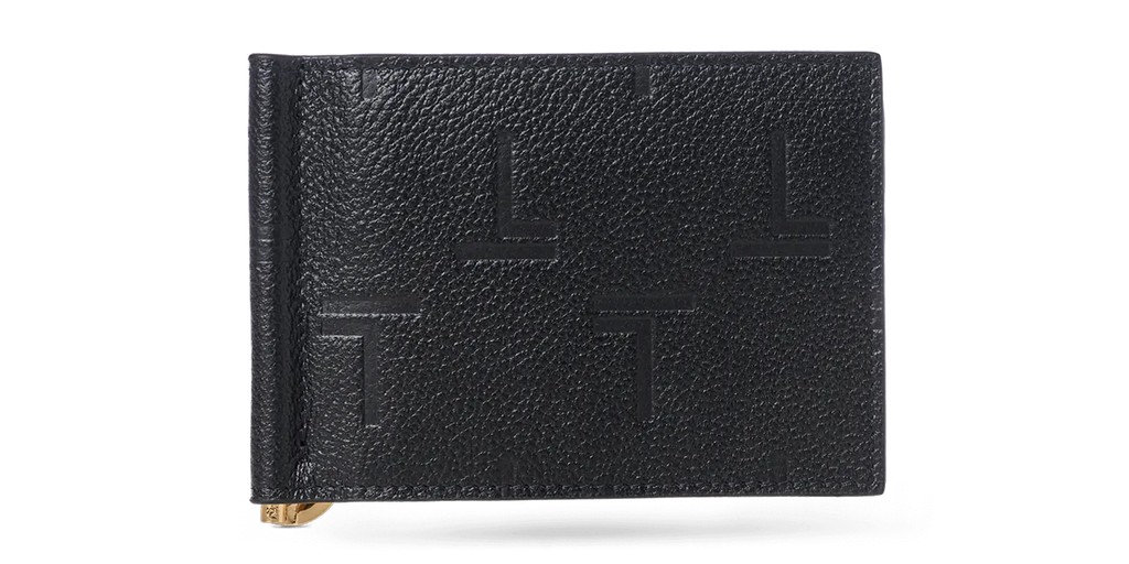 A black lambskin Trevony Intimo bill clip wallet with embossed monogram design, featuring a visible gold-tone money clip on the side.
